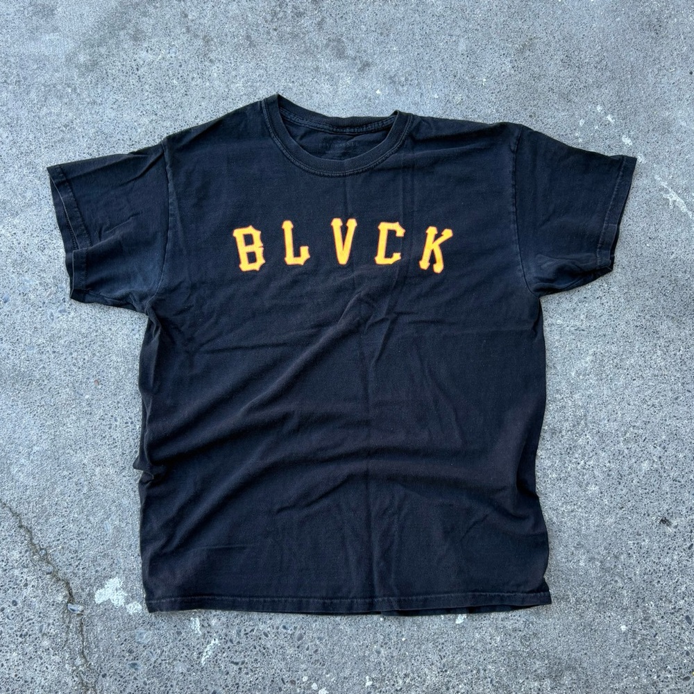 Black T-Shirt with Yellow Lettering